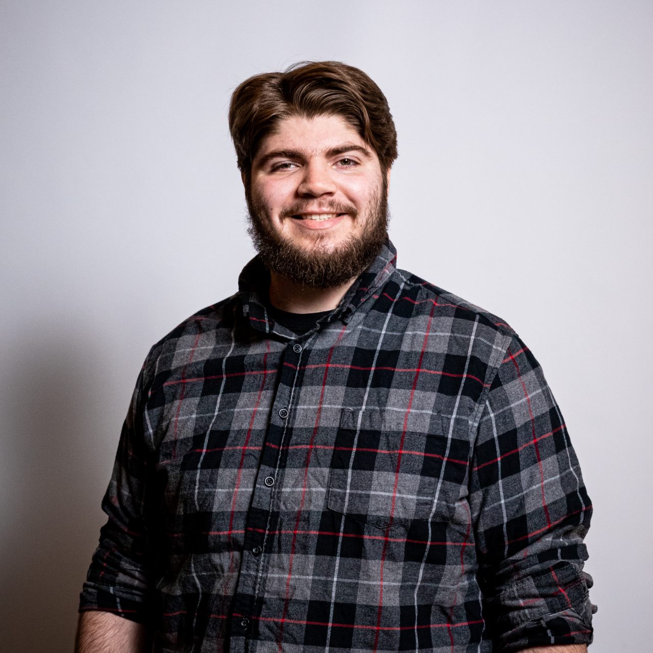 Image of a smiling student at a photoshoot