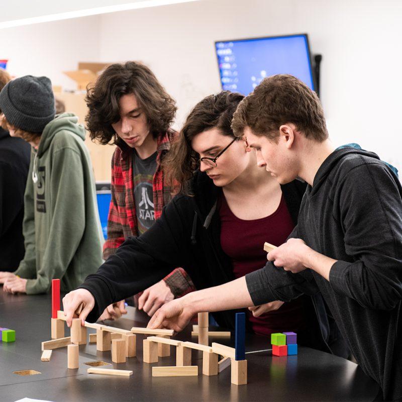 Students designing gameplay using blocks